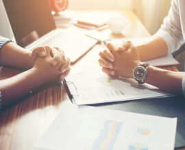 Close-up of  Team Business people discussing a financial plan at office.