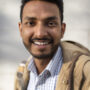 smiley-man-posing-medium-shot